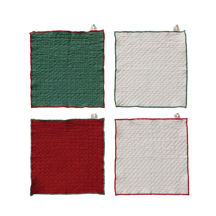 Four square fabric samples in green, white, red, and white on a white background