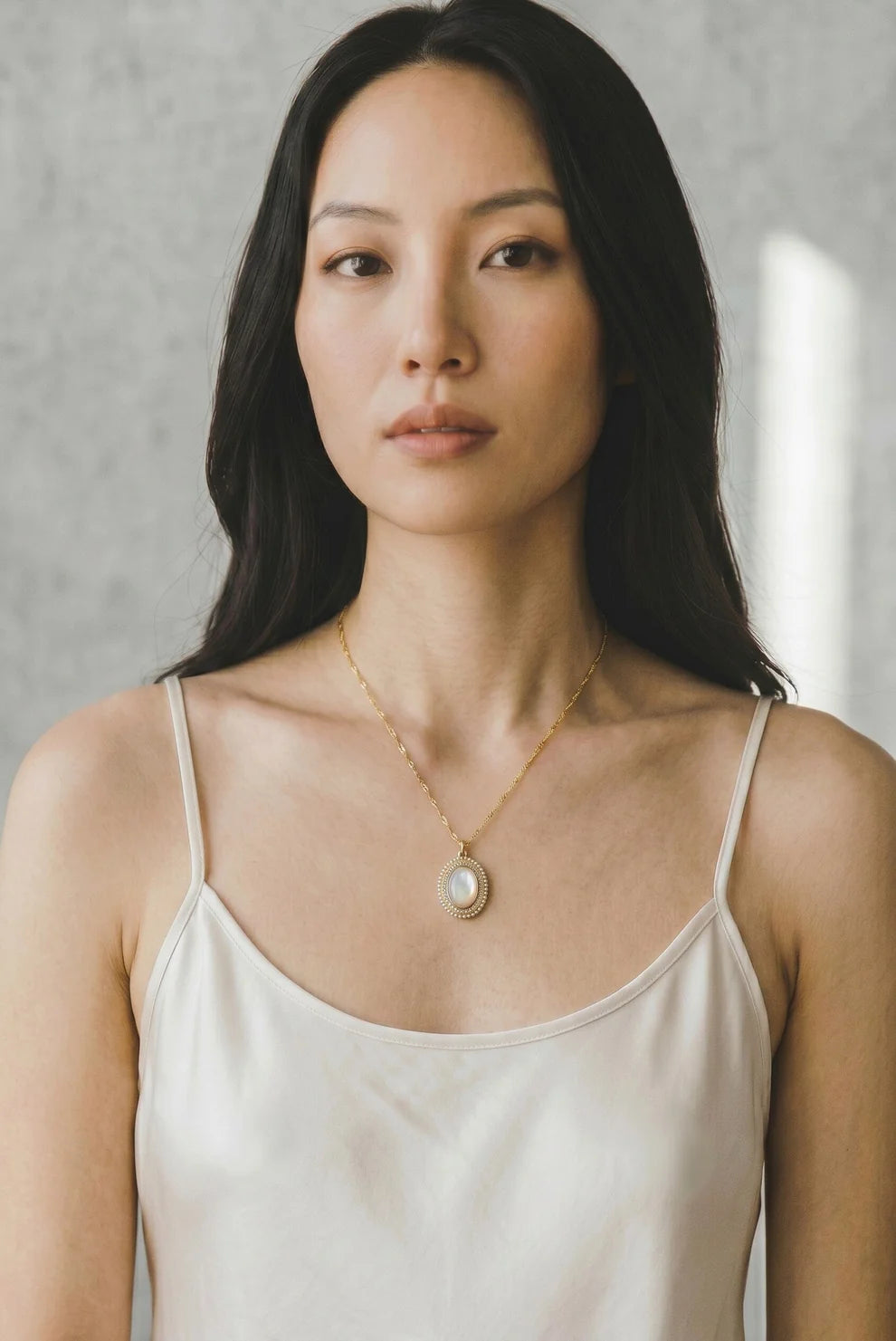 Athena Designs Mother of Pearl, Pearl & CZ Oval Pendant