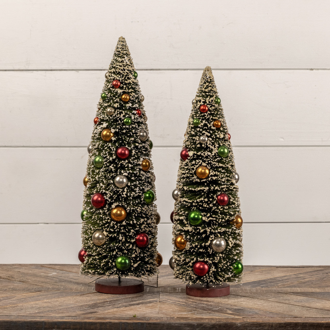 Snowy Trees With Multi-Colored Ornaments