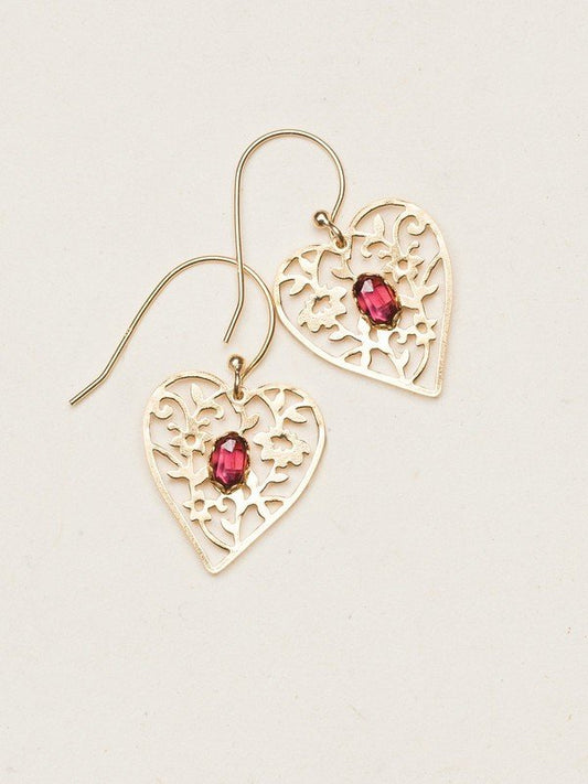 Our Blooming Heart Earrings are a work of tender beauty. The art of metal cutting is gorgeously displayed in this elaborate depiction of emerging springtime foliage, where a dazzling gemstone blooms brightly from the center.