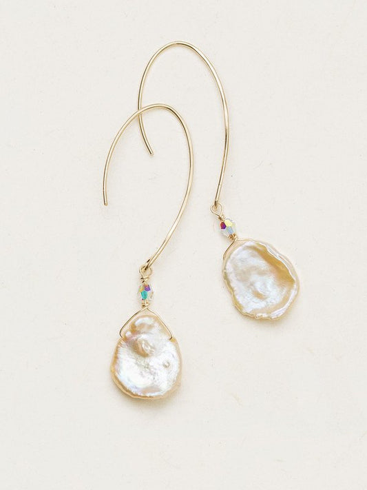 A luminous complement to your own individual style and beauty, our lustrous, radiant, and intriguingly unique Margo Open Hoop Earrings are the ultimate treasure. Rare, free-form Keshi pearls give way to distinctive shapes, sizes, and inclusions, meaning no two are exactly alike. The open hoop ear wire and dainty anchor beads provide an alluring combination of sophisticated whimsy.