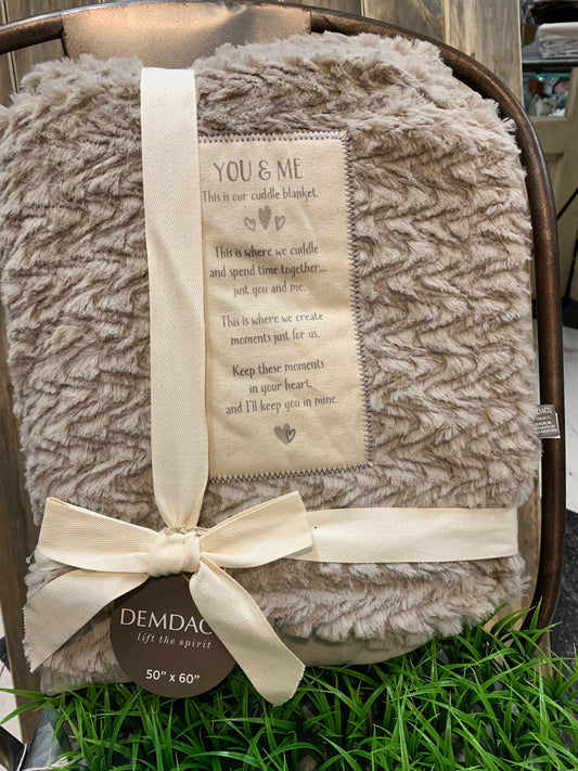 When you want to make those bonding moments with a loved one even more special, consider adding this blanket to your quiet times together. Make sharing time with a child or a partner a wonderful memory. The full-size You and Me Cuddle Blanket in taupe is a perfect piece for cuddling on the couch or sharing a bedtime story with your little one.