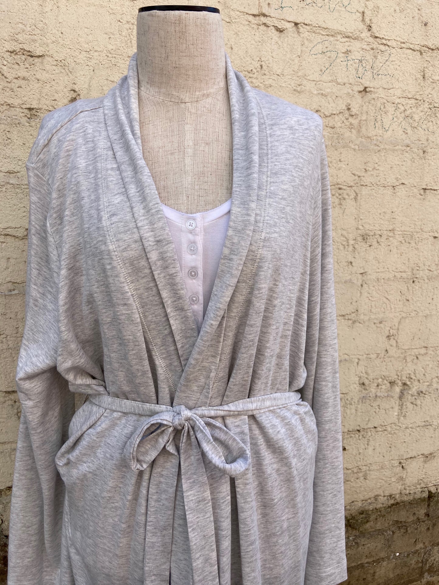 Relaxed fit, pebble grey robe. 95% Modal/5% Spandex. Back of robe has words that read, "Sleep in".