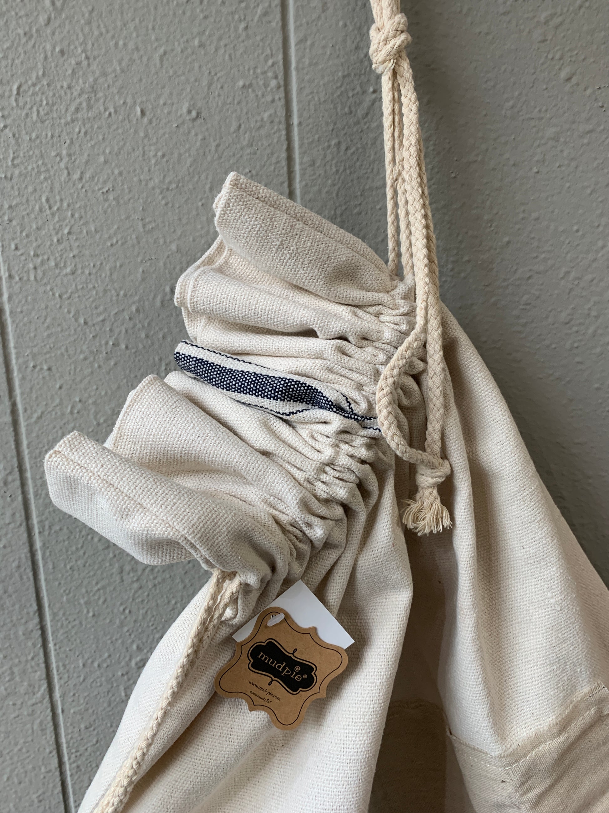 Grainsack laundry bag features applied front canvas patch with frayed edges and "Dry Cleaning" printed sentiments and canvas rope drawstring.  Size: 30" x 22"