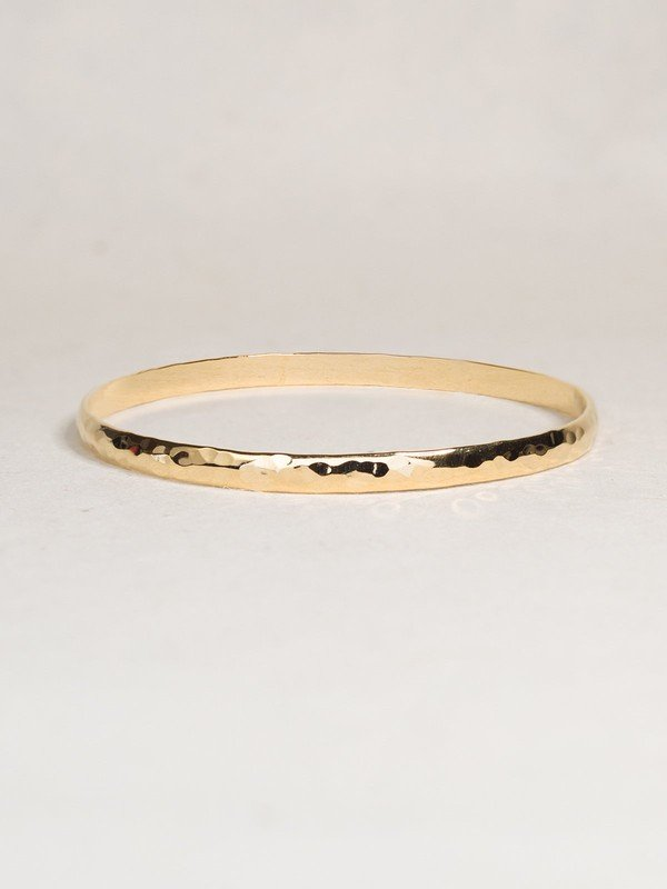 Holly Yashi Everyday Bangle. Add some sparkle and shine with our gold and silver overlay Everyday Bangle. Pretty on its own or worn in layers, this is a classic bracelet you'll want to wear with everything!