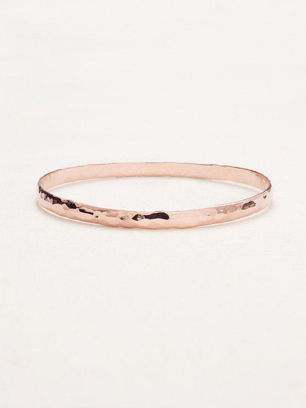 Holly Yashi Everyday Bangle. Add some sparkle and shine with our gold and silver overlay Everyday Bangle. Pretty on its own or worn in layers, this is a classic bracelet you'll want to wear with everything!