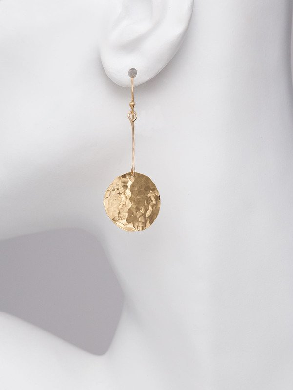 Holly Yashi Gold Medium Mirador Earrings. Give everyday ensembles a boost with scintillating orbs of hand-hammered precious metal. Contemporary texture and shine take you seamlessly from day to night and season to season.
