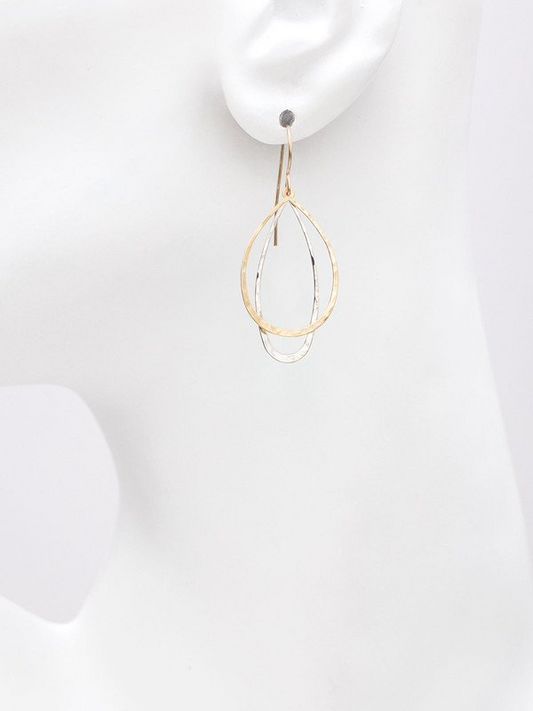 Holly Yashi In The Loop Earrings. Our In the Loop Earrings feature two metallic drop hoops in modern silhouettes. Light and ultra-thin, these drop earrings make a statement without adding any weight. Whether styled for day or night, these earrings are sure to turn heads.