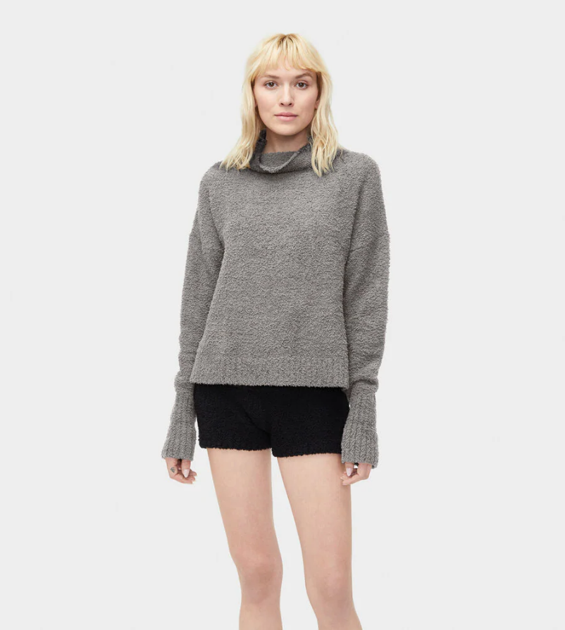 UGG Sage Sweater. A cozy turtleneck with an understated aesthetic, our Sage sweater is a staple piece for any winter wardrobe. Pair it with elevated skirts and trousers for a night on the town, or wear around the house with your favorite sweatpants.