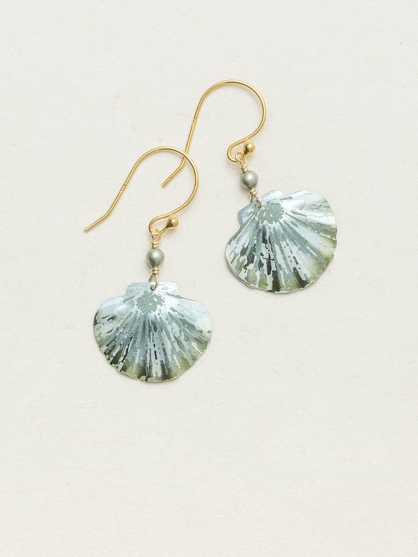 Holly Yashi Sage Shelby Earrings. An iconic remembrance of the sea, our darling Shelby Earrings features a chic clamshell and dainty Swarovski crystal pearl for a look that comes straight from a day on the coast. This elegant design makes for an easy wear-with-anything accent.