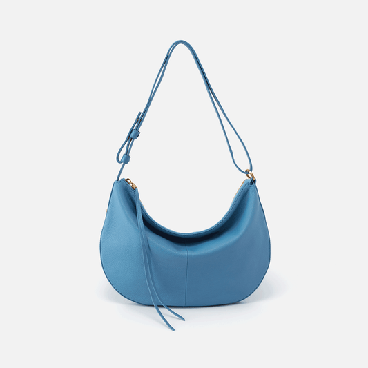 Meet Cosmo. A beautiful half-moon shaped bag with a convertible strap, allowing you to wear it as a shoulder bag or crossbody. Crafted in our signature velvet hide, our softest and most casual leather that only gets more beautiful over time.