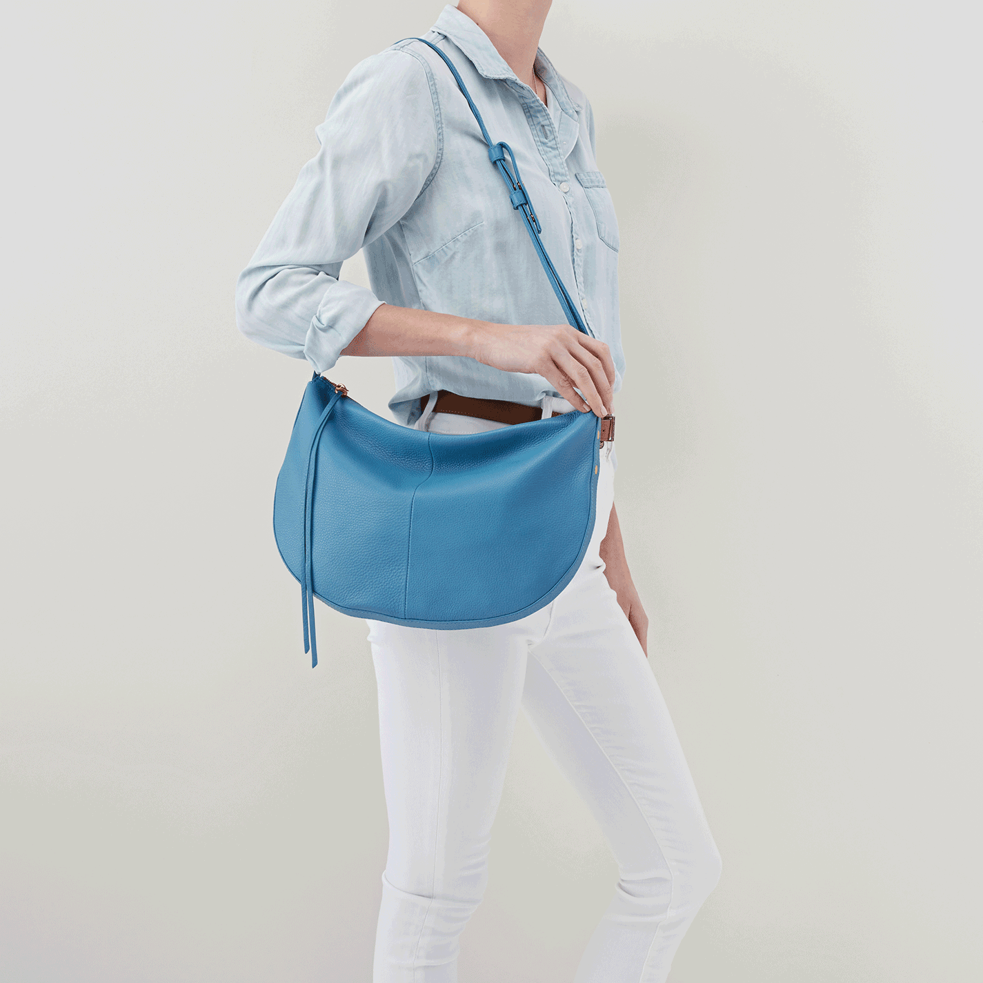 Meet Cosmo. A beautiful half-moon shaped bag with a convertible strap, allowing you to wear it as a shoulder bag or crossbody. Crafted in our signature velvet hide, our softest and most casual leather that only gets more beautiful over time.