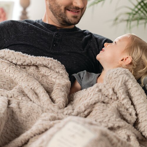 When you want to make those bonding moments with a loved one even more special, consider adding this blanket to your quiet times together. Make sharing time with a child or a partner a wonderful memory. The full-size You and Me Cuddle Blanket in taupe is a perfect piece for cuddling on the couch or sharing a bedtime story with your little one.